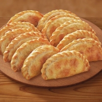 12 Empanadas carne o jamón y queso