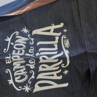 Pechera Jeans "El campeón de la parrilla"